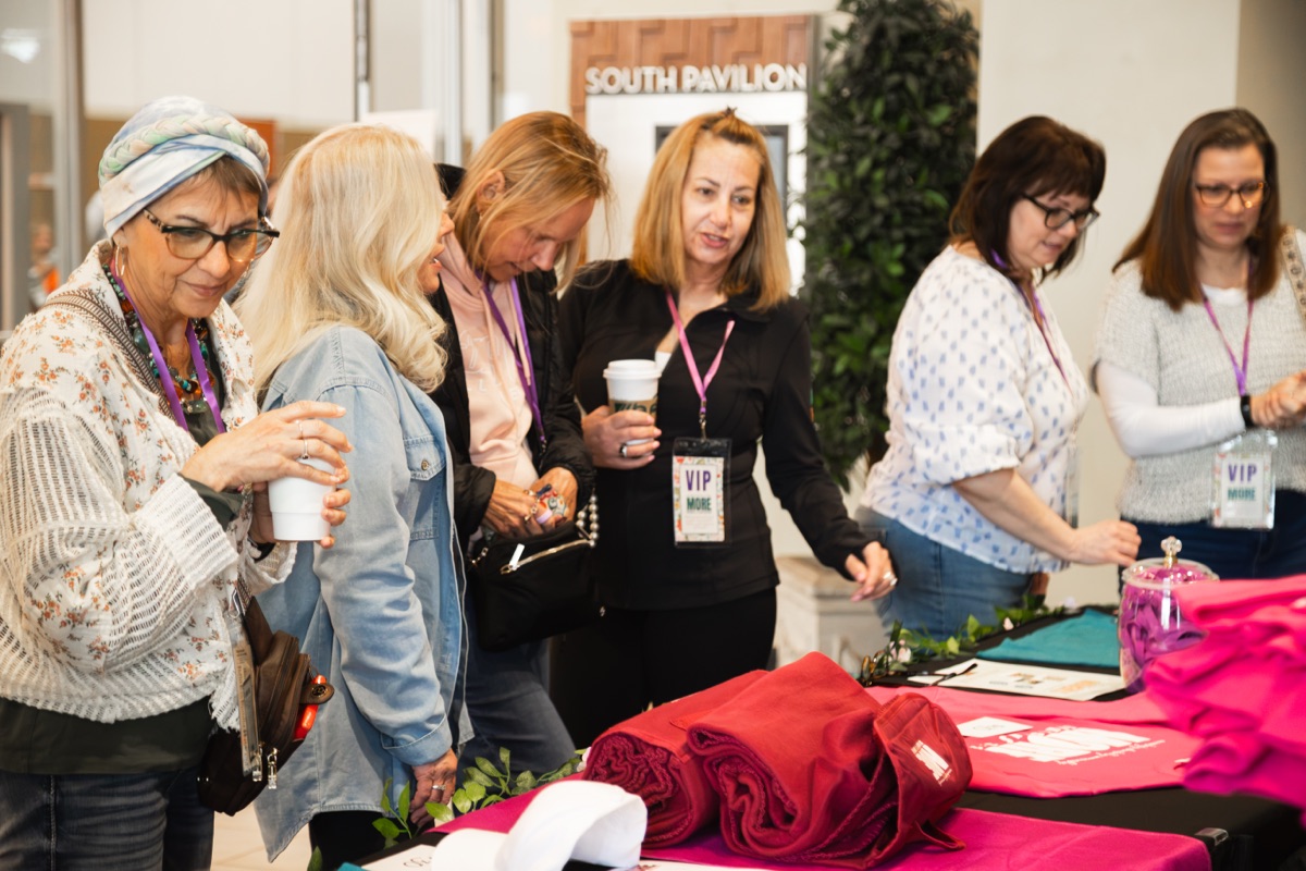 Guests browsing MORE merchandise